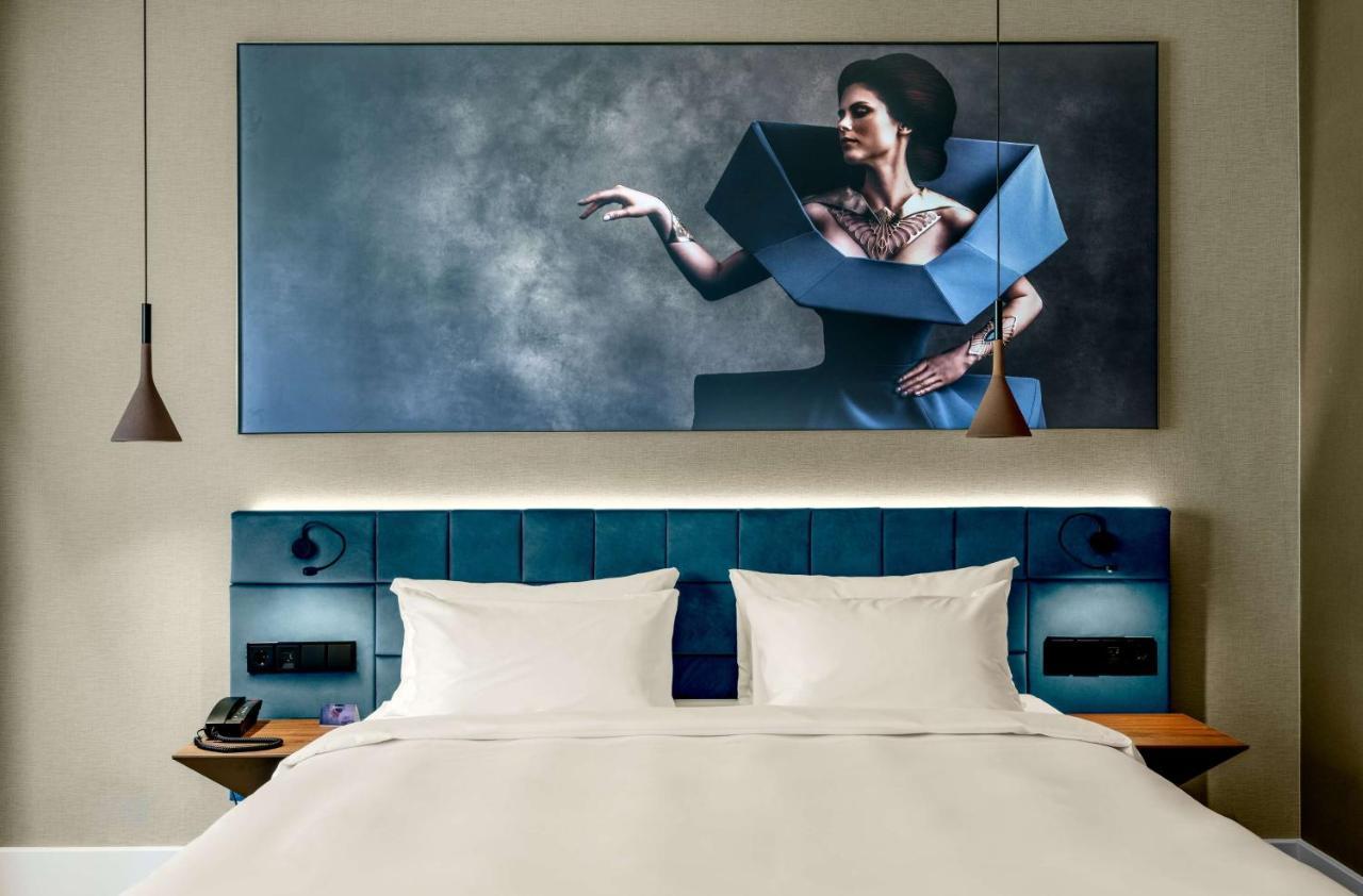 Radisson Blu Aurum Hotel, Brasov Luaran gambar A bedroom at the hotel